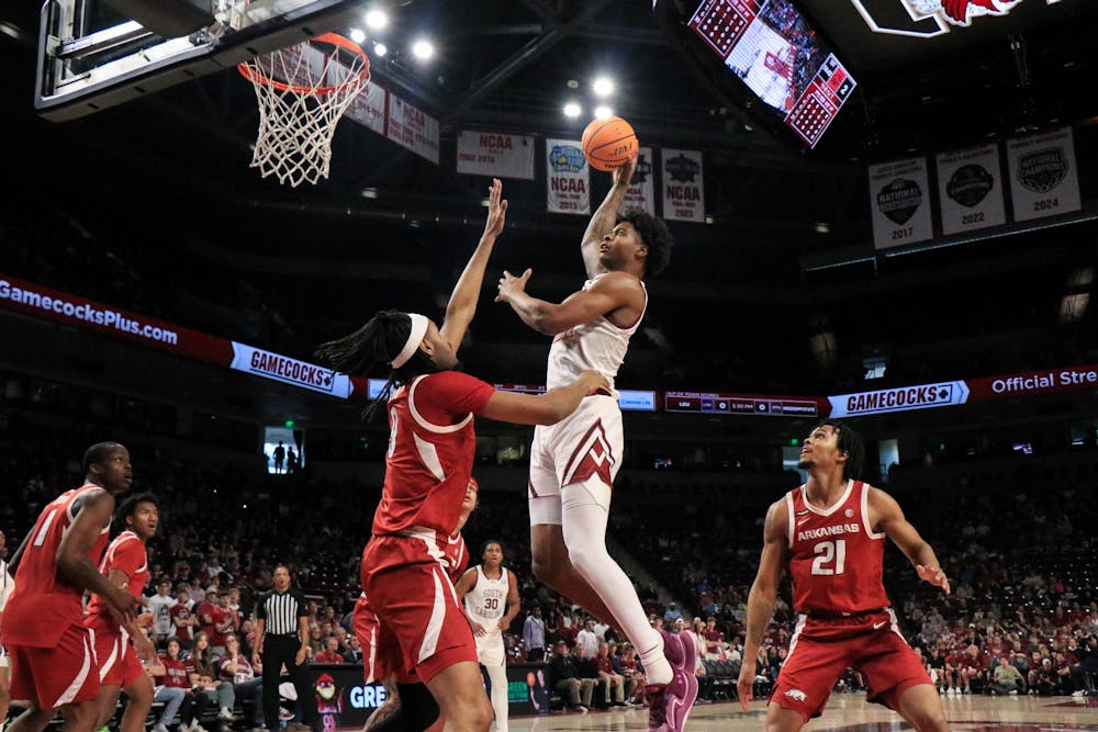 <p>Graduate student Nick Pringle leaps toward the basket to score in the game against Arkansas on March 1, 2025, at Colonial Life Arena in Columbia, SC. Pringle’s presence in the paint provided the Gamecocks with a strong inside scoring option throughout the matchup.</p>