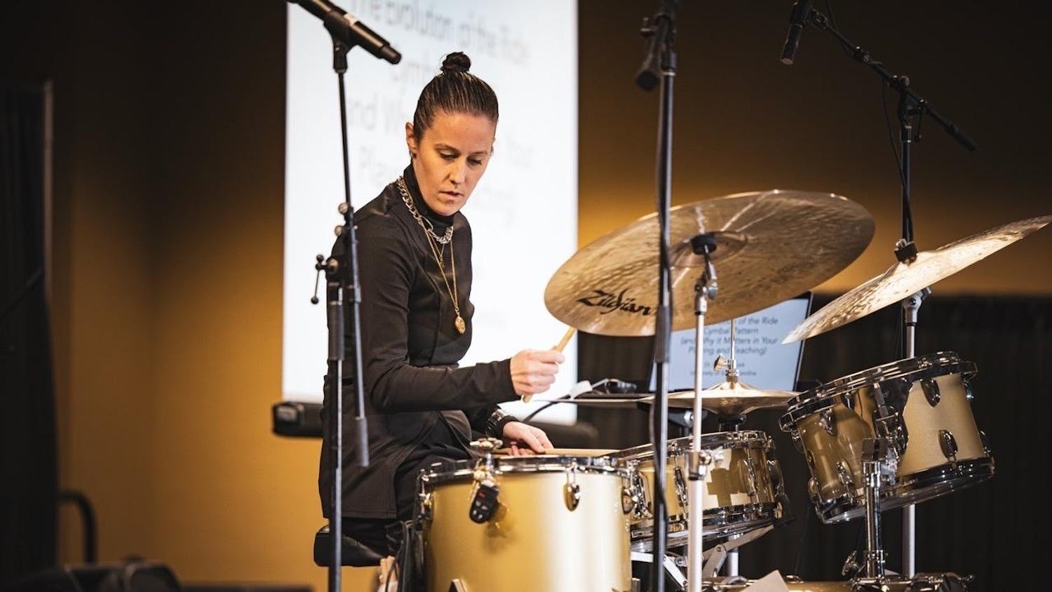 Colleen Clark, an assistant professor of jazz studies in the USC School of Music, performs at the Percussive Arts Society International Convention in Indianapolis, Indiana, on Nov. 9 and 10, 2023. Clark is set to perform on "Late Night with Seth Meyers" as a guest drummer with the show's 8G Band starting on Jan. 29, 2024.