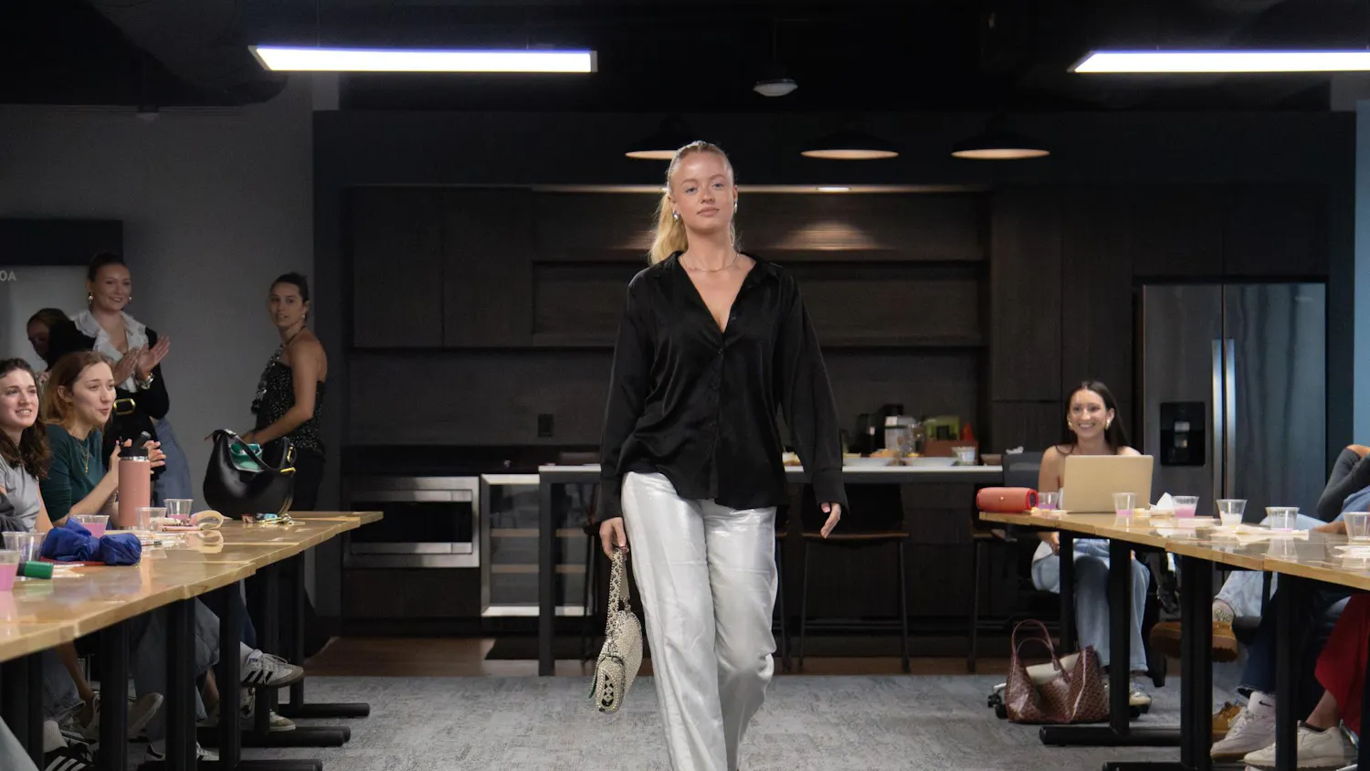 Model walks the runway during a fashion show on March 31, 2025, showcasing professional, modern ensemble. The event featured innovative designers, competing for a chance to collaborate with Goodwill in USC's Fashion Board's next show.