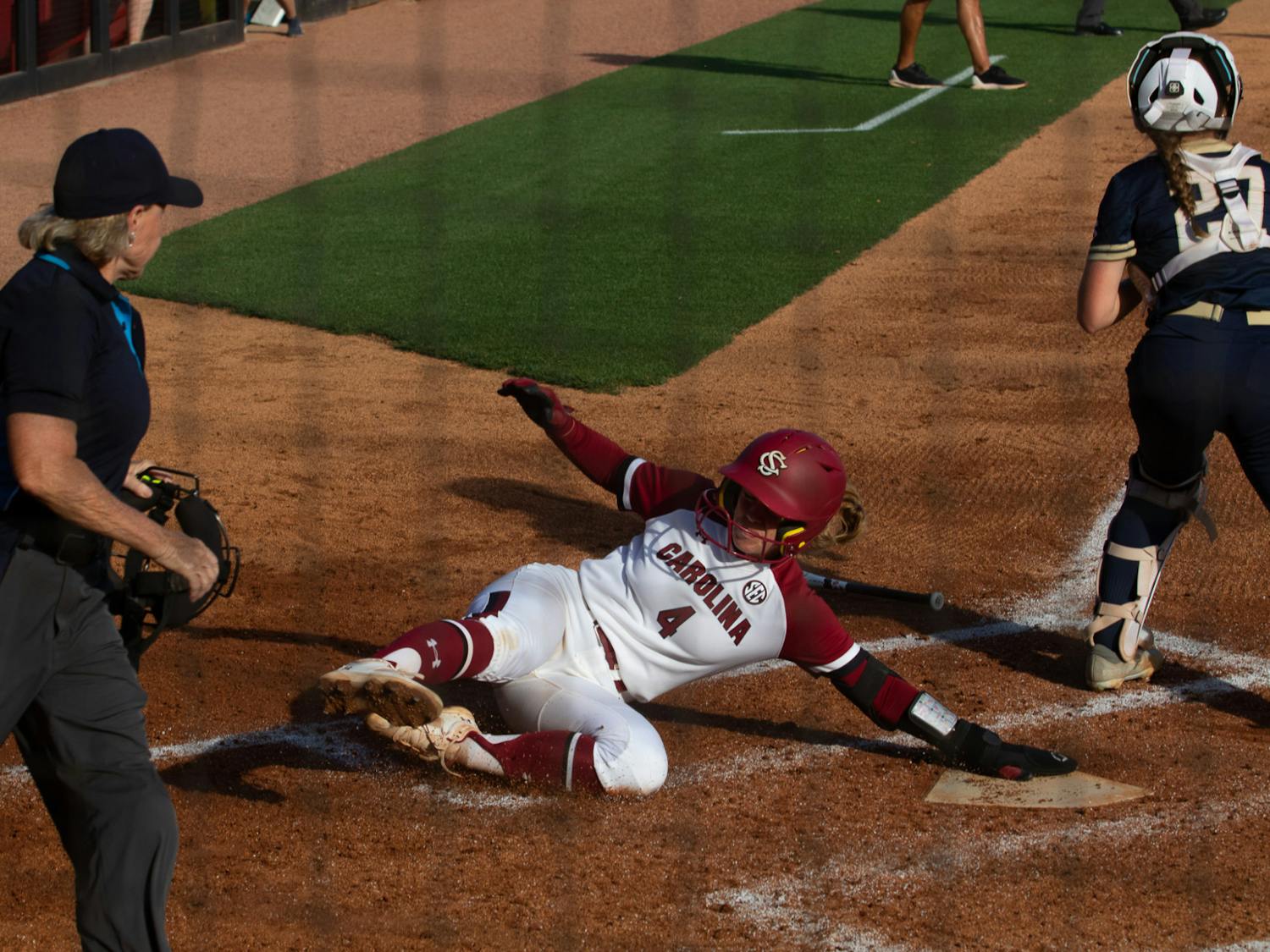 Junior infielder and outfielder Riley Blampied slides into home plate for the third run of the game against Charleston Southern on April 19, 2023. In the second game of a doubleheader, the Gamecocks beat the Buccaneers 11-2 in five innings. &nbsp;