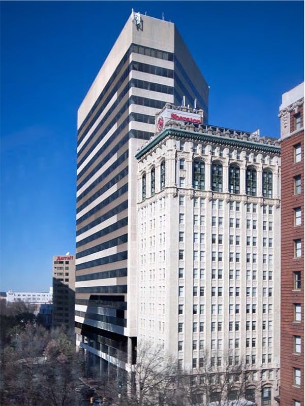 Final designs for the Palmetto Center building feature white and gray bands.