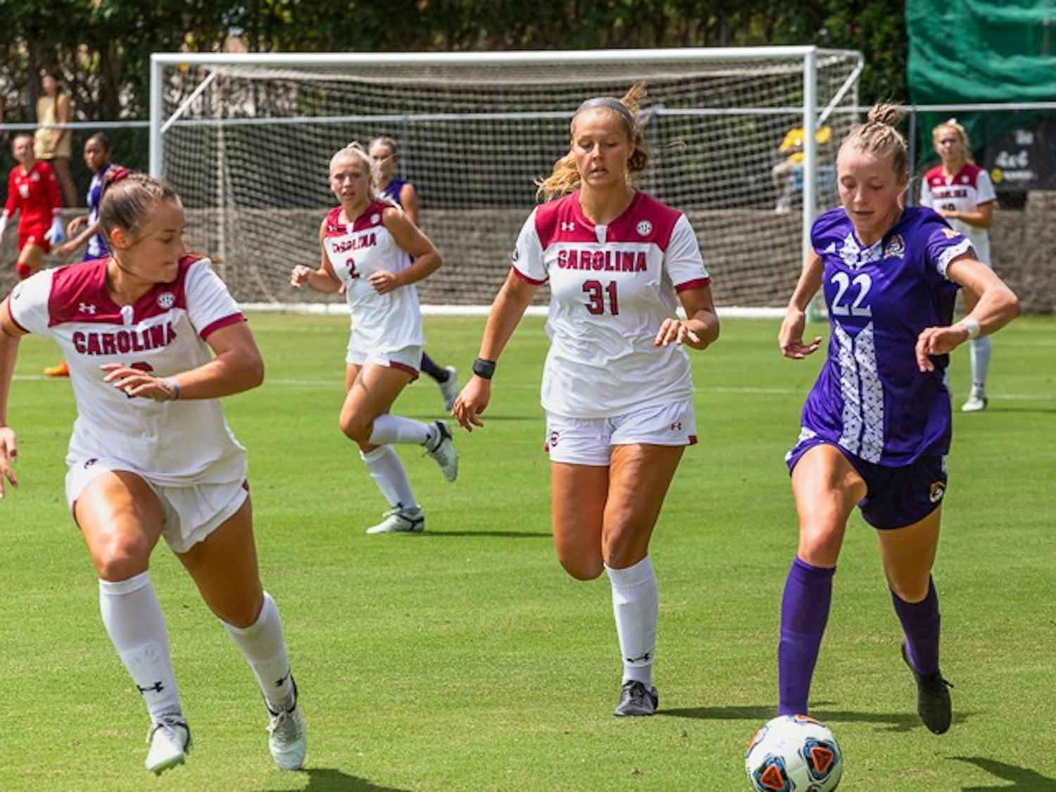 Eastern Carolina Junior Forward Sydney Schnell kicks the ball down the field as the Gamecocks attempt to take the ball on August 21, 2022. South Carolina beat Eastern Carolina 2-0.&nbsp;