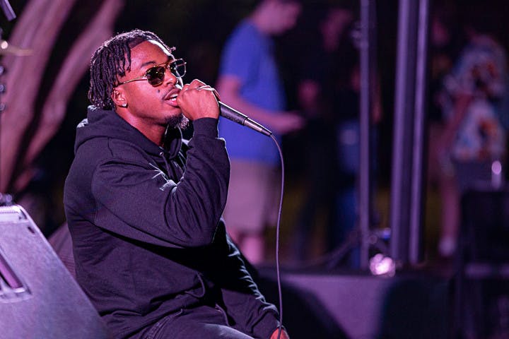 Fourth-year sports and entertainment management student Joshua Jordan, known as The Gamecock Rapper, sings to the crowd during the Battle of the Bands on Oct. 5, 2022. The winner of the competition gets to perform at the UofSC Homecoming Block Party on Oct, 28, 2022.