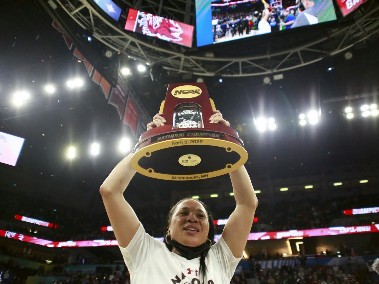 Head coach Dawn Staley takes in the confetti after South Carolina won the National Championship, defeating the Huskies 64-49 on April 3, 2022.