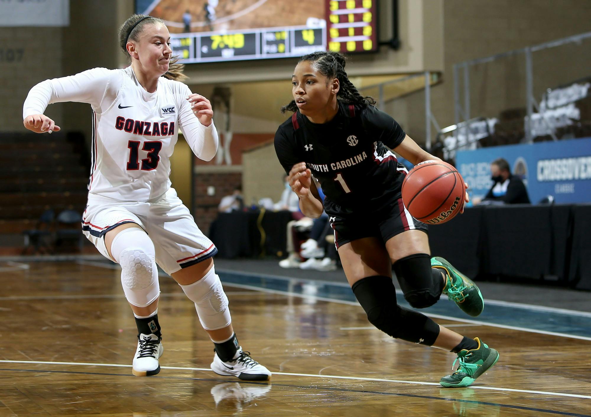 Sophomore guard Zia Cooke dribbles the ball around a Gonzaga defender. The Gamecocks won the game 79-72.