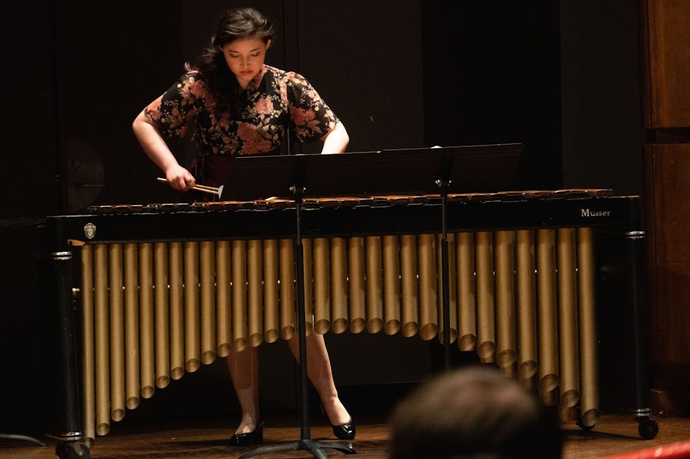 <p>Asian-American student Anna Thamasett performs "The Source" by Japanese composer Toshi Ichiyanagi on the marimba.</p>
