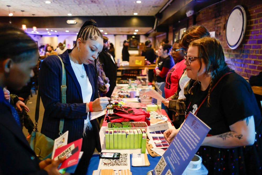 <p>A member of Planned Parenthood speaks with a patron at the Bands Not Bans charity concert at New Brookland Tavern on Jan. 25, 2025. The event was put on to raise money for the Palmetto State Abortion Fund and Planned Parenthood.</p>