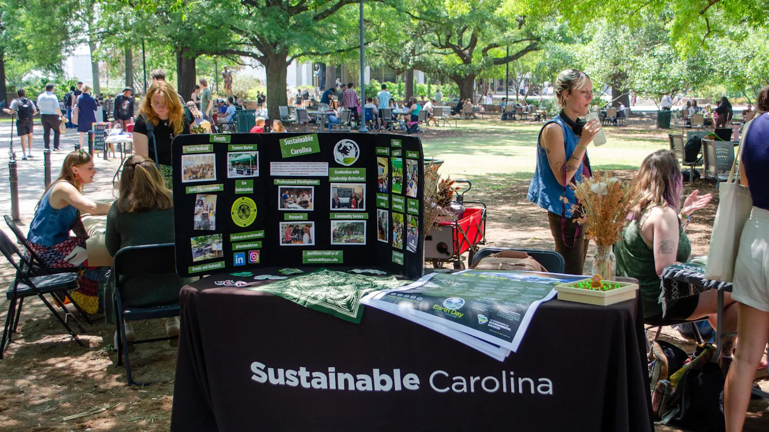 Sustainable Carolina displays a trifold about its organization at its Earth Day event on Davis Field on April 22, 2026. Students attended the event to learn about and celebrate Earth Day.