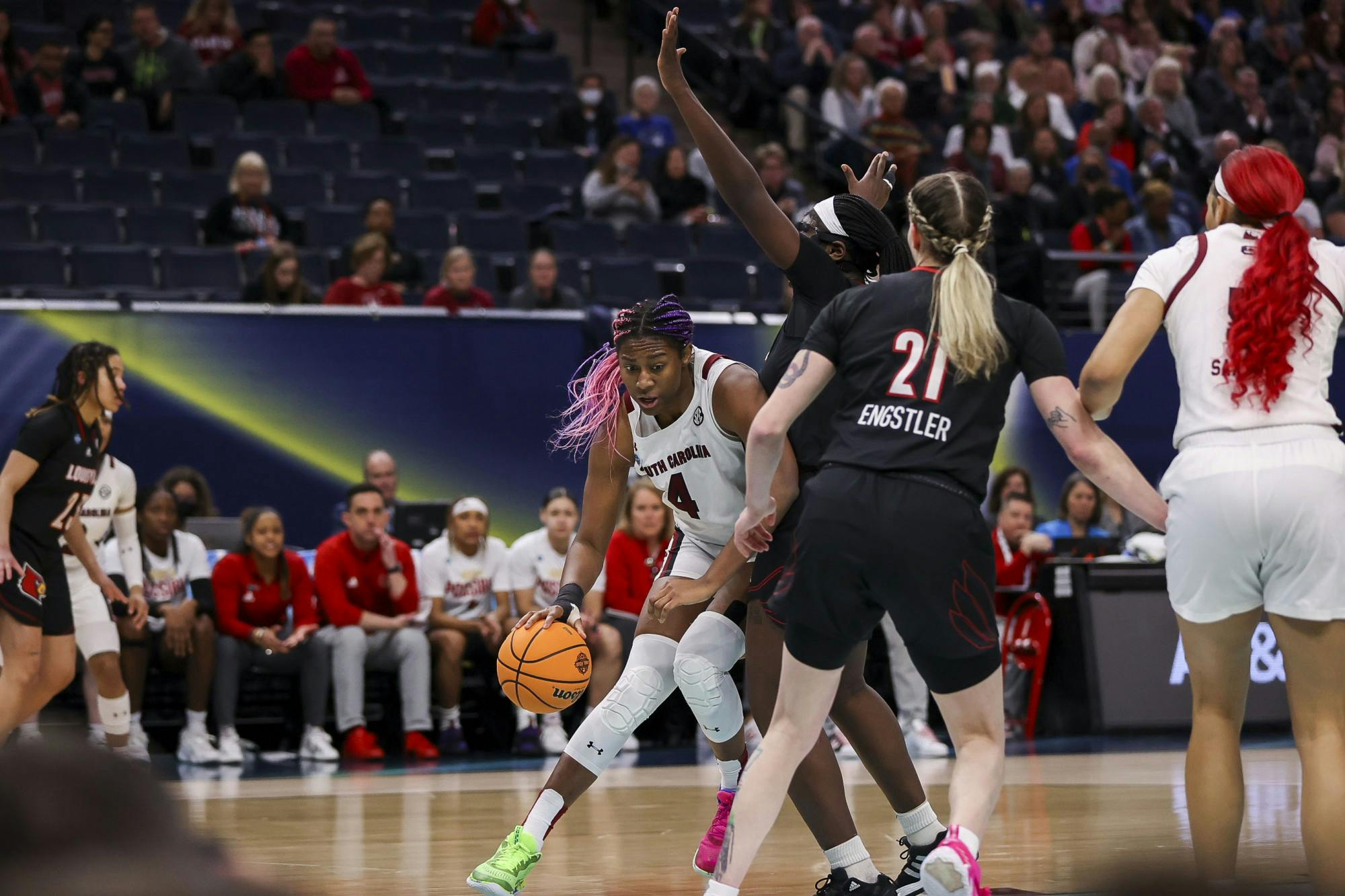 Junior forward Aliyah Boston pushes the ball past defenders during the first quarter of South Carolina's 72-59 victory over Louisville on April 1, 2022, advancing to the National Championship game.