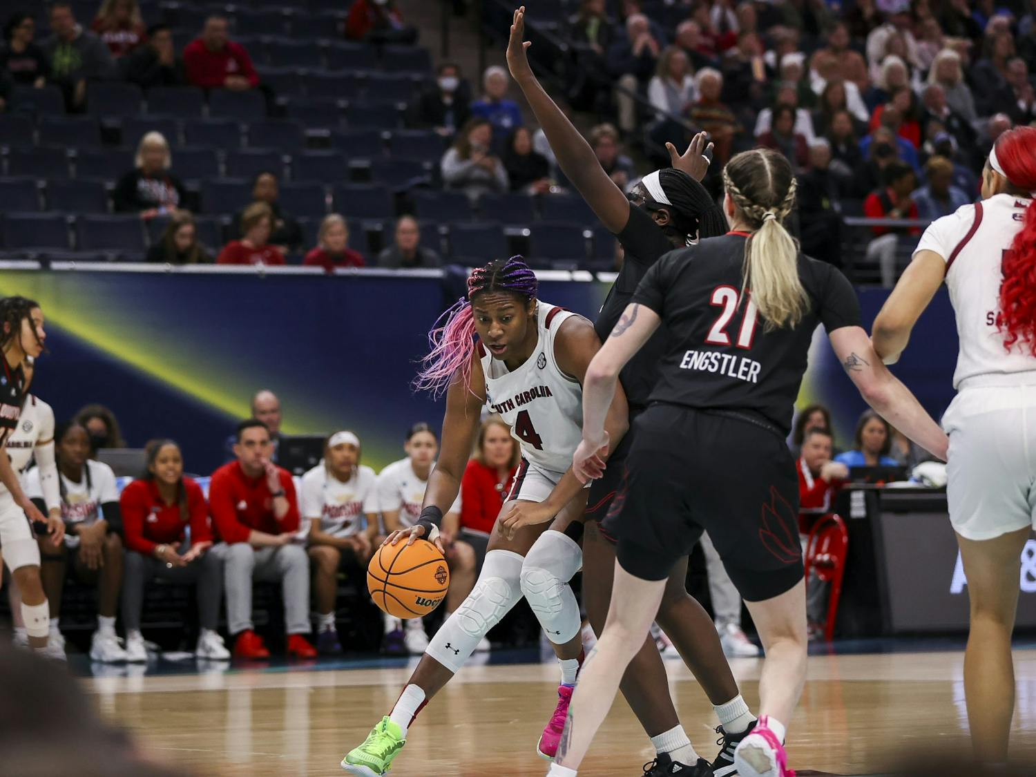 Junior forward Aliyah Boston pushes the ball past defenders during the first quarter of South Carolina's 72-59 victory over Louisville on April 1, 2022, advancing to the National Championship game.