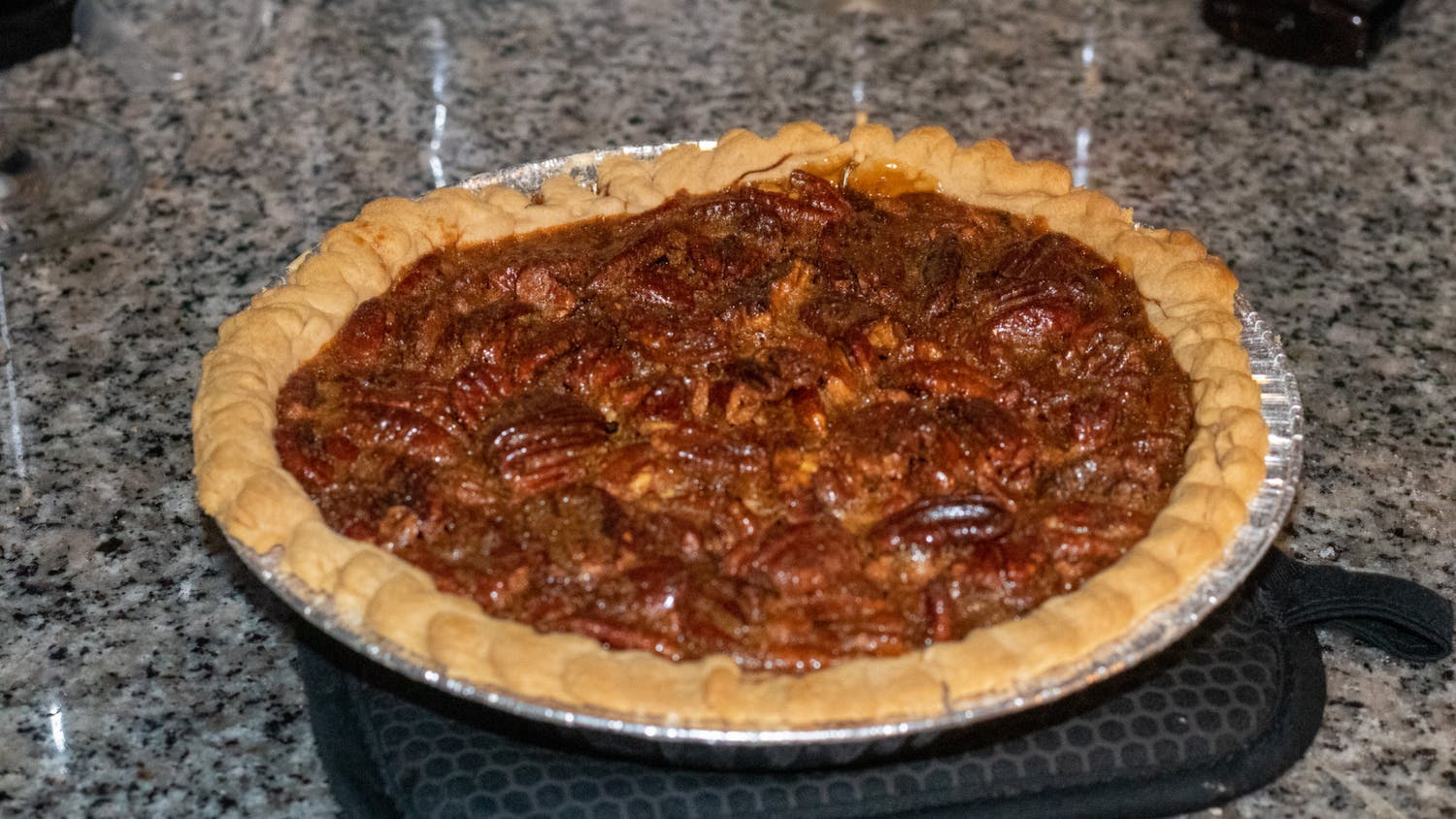 An easy to make, delicious homemade pecan pie cooling on the counter on Jan. 11, 2023. This comfort cooking is a fantastic slice of life that is hard to pass up.