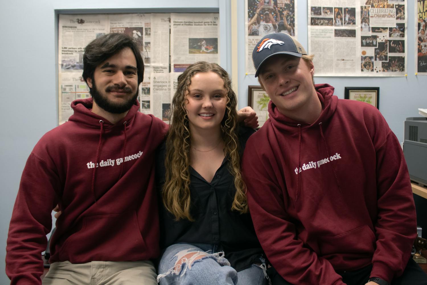 The Daily Gamecock's managing staff poses for a photo in the newsroom on Nov. 20, 2022. Editor-in-Chief Kailey Cota and managing editors Tyler Fedor (left) and Michael Sauls (right) have each worked with The Daily Gamecock for seven semesters and will step down on Dec. 12, 2022.