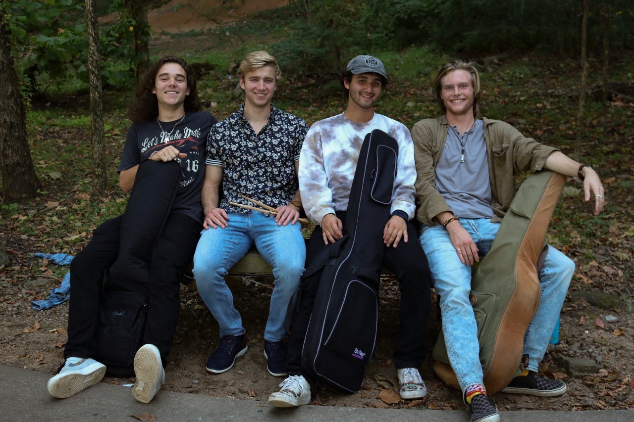 The members of “The Third Floor” band from left to right: Nick Guzman, Logan Cory, Neal Goldberg and Ryan Pellatt pose together with their instruments on Oct. 7, 2022. The band members use their music as a way to express their emotions and bring light to issues concerning mental health.