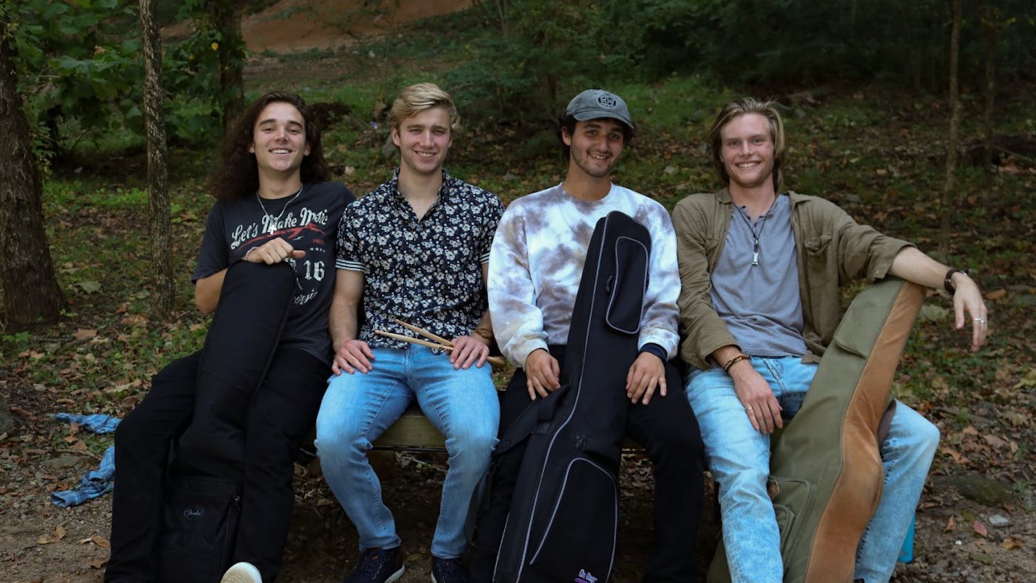 The members of “The Third Floor” band from left to right: Nick Guzman, Logan Cory, Neal Goldberg and Ryan Pellatt pose together with their instruments on Oct. 7, 2022. The band members use their music as a way to express their emotions and bring light to issues concerning mental health.