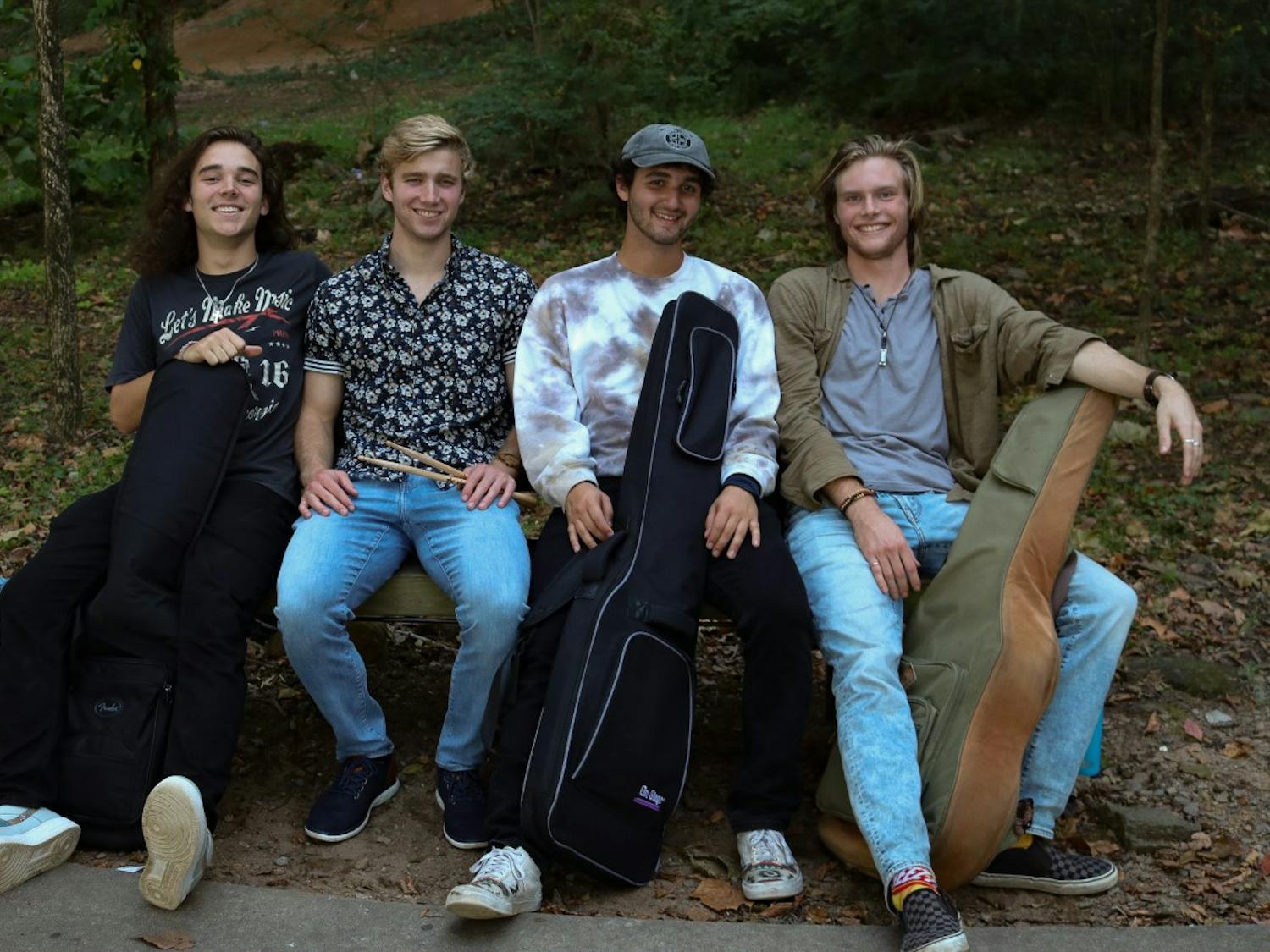 The members of “The Third Floor” band from left to right: Nick Guzman, Logan Cory, Neal Goldberg and Ryan Pellatt pose together with their instruments on Oct. 7, 2022. The band members use their music as a way to express their emotions and bring light to issues concerning mental health.