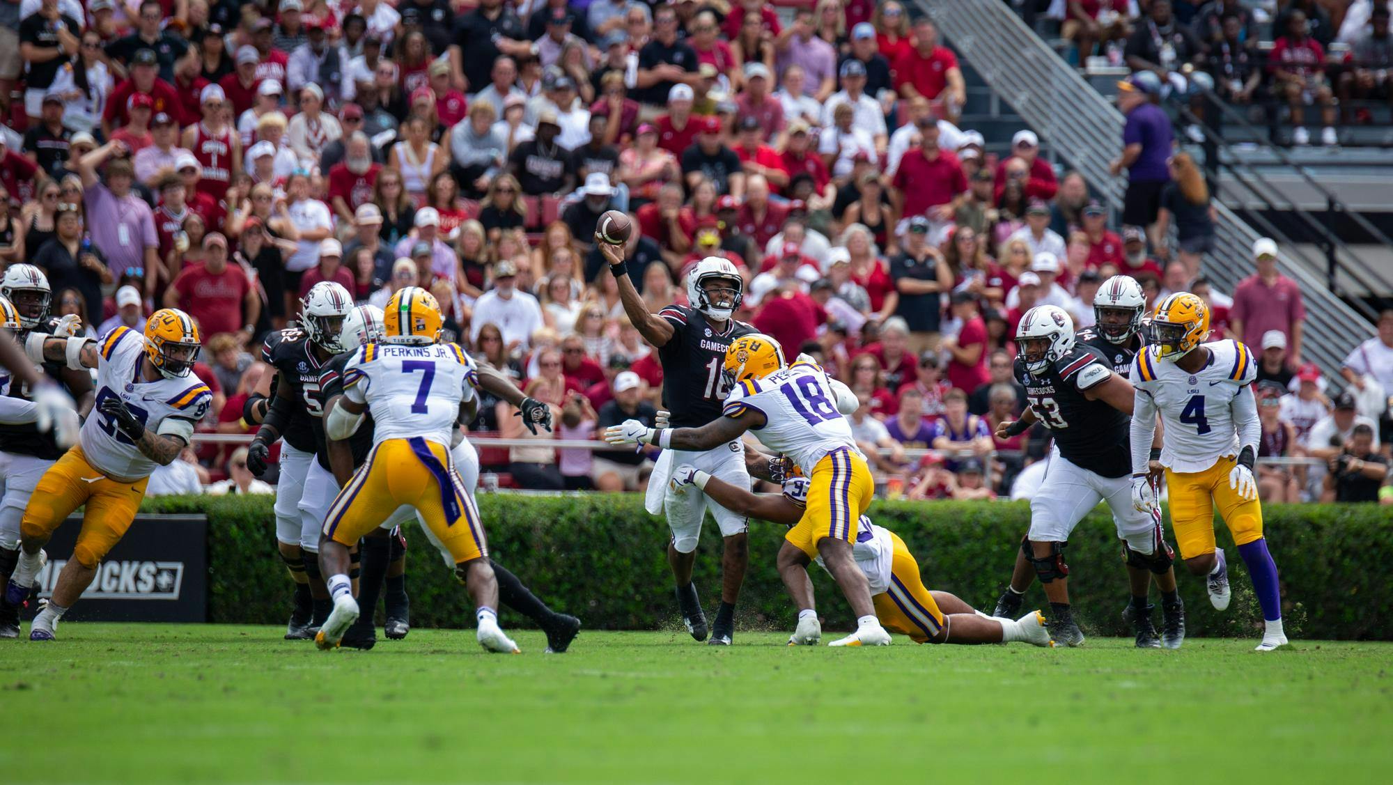 FILE — Then-redshirt freshman quarterback LaNorris Sellers throws the ball down the field as LSU defenders tackle him Sept.14, 2024. The Tigers defeated the Gamecocks 36-33.