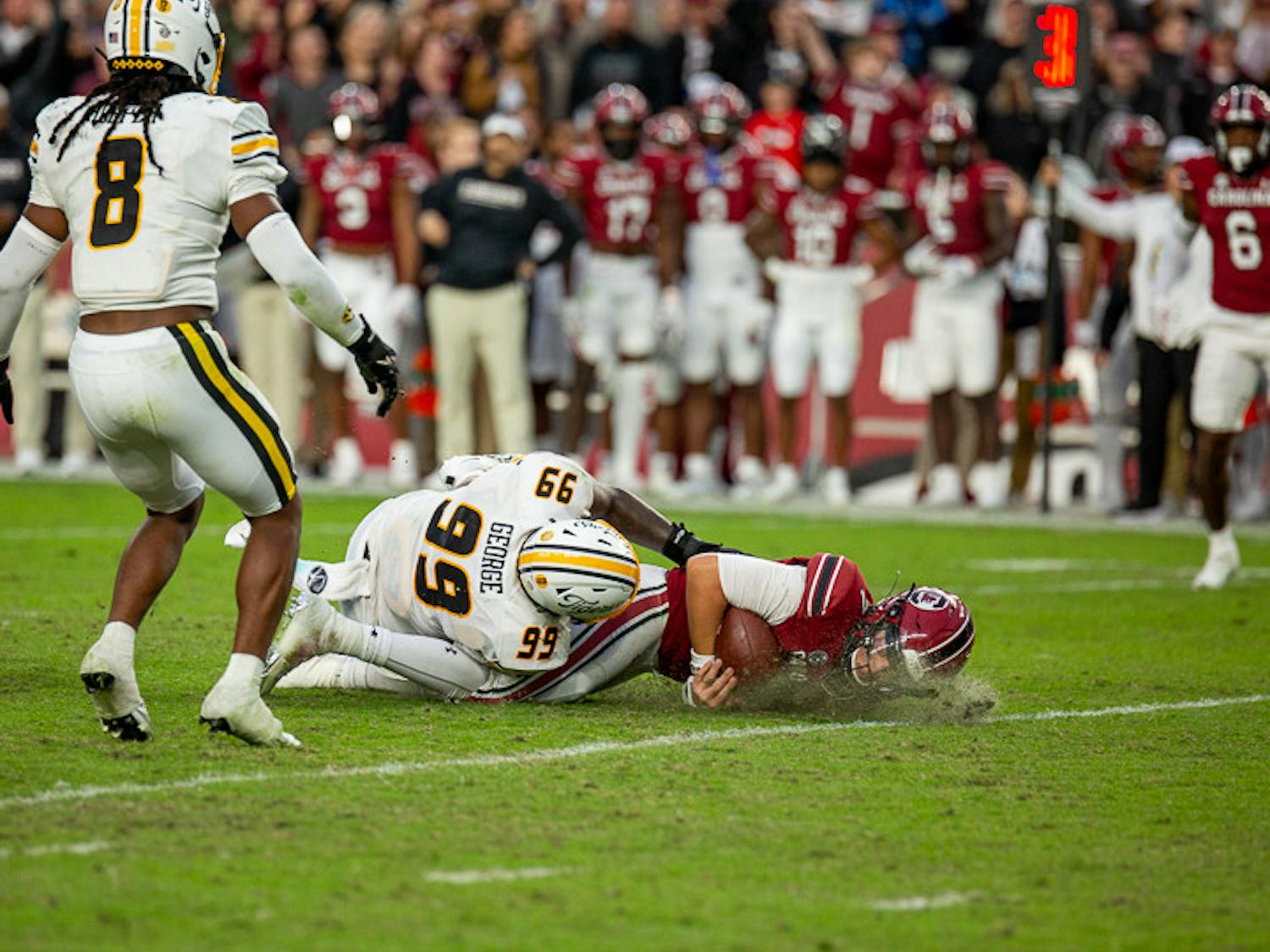 Redshirt junior quarterback Spencer Rattler gets tackled after attempting to scramble the ball down the field during the South Carolina vs. Missouri game on Oct. 29, 2022. . The Tigers beat the Gamecocks 23-10.