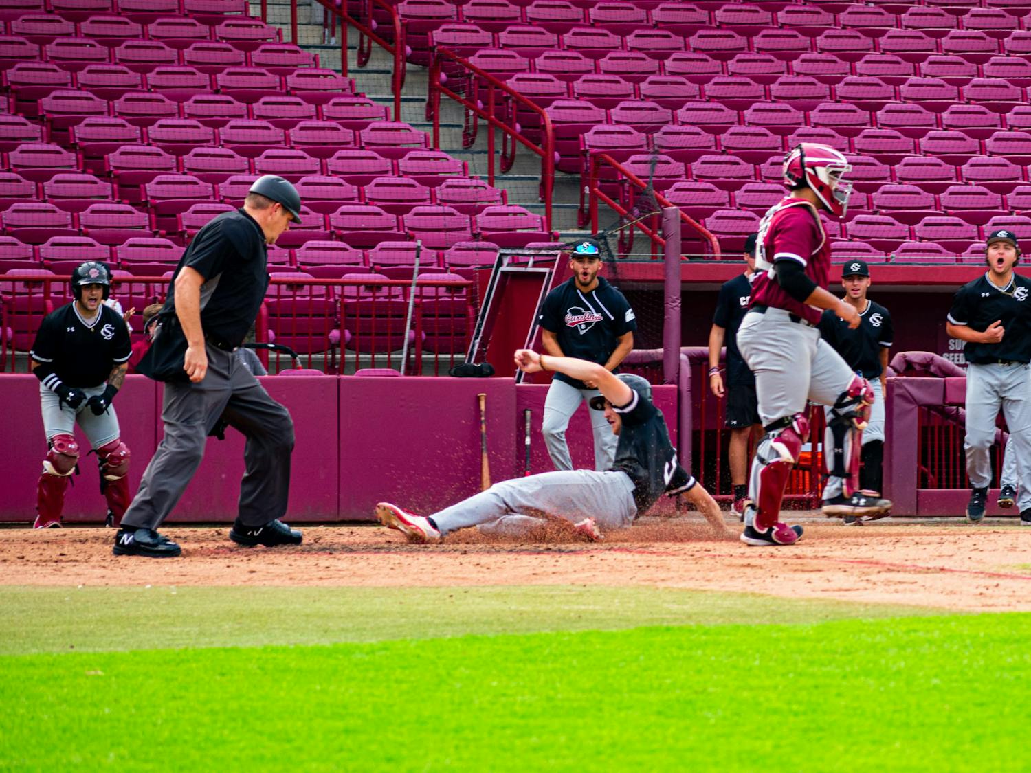 Senior infielder Braylen Wimmer slides into home plate scoring a run for the Black team during their scrimmage on Nov. 2, 2022. Wimmer played and started in all 55 games for South Carolina last season, making him the only Gamecock to start every game for the 2022 season.