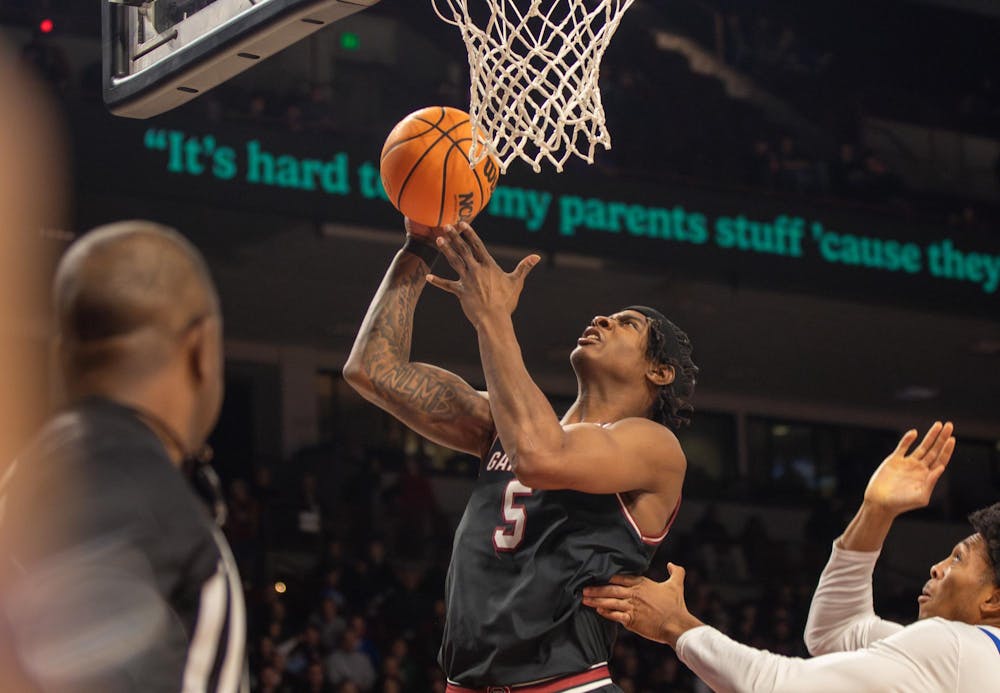 <p>FILE — Graduate forward Nick Pringle attempts to score a layup against Florida on Jan. 22, 2025, at Colonial Life Arena. The Gamecocks faced the Gators for a second time on Feb. 15 in Gainesville, Florida, losing 88-67. </p>