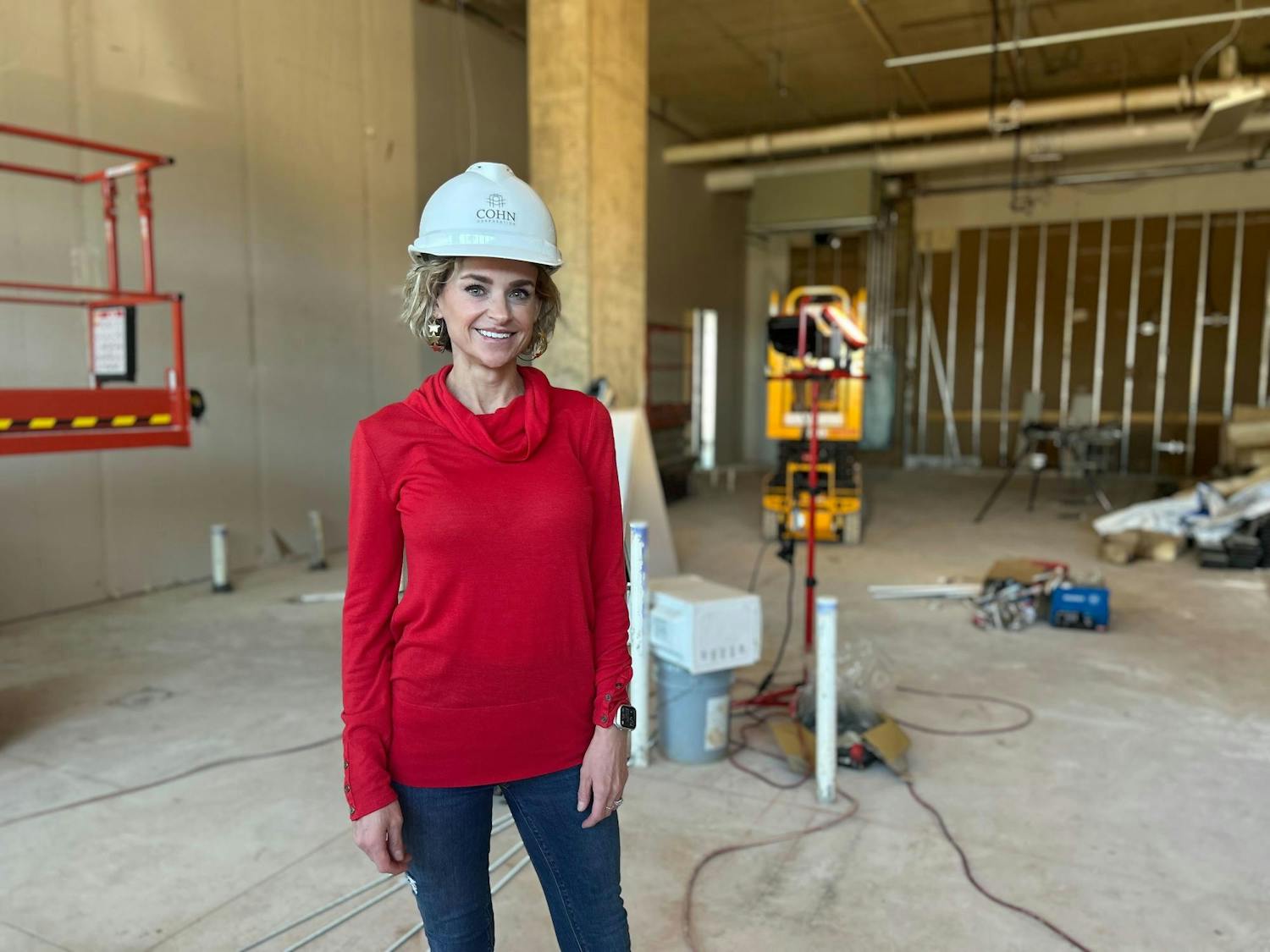 Owner Ashley Lamb stands inside the construction of the retail space for the new Pvolve Studios in the Bull Street District on Feb. 14, 2023. Located in the new Bennett at Bull Street Apartments, Pvolve Studios opened in May to offer many different workouts and training programs.