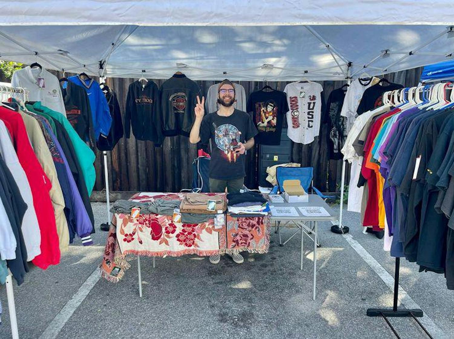Josh Rogers poses for a picture at Snips Vintage during a pop-up thrift fair in October. The Gamecock Vintage Market aims to unite vendors from all over both North and South Carolina with 鶹С򽴫ý students who are looking to thrift in a sustainable way.