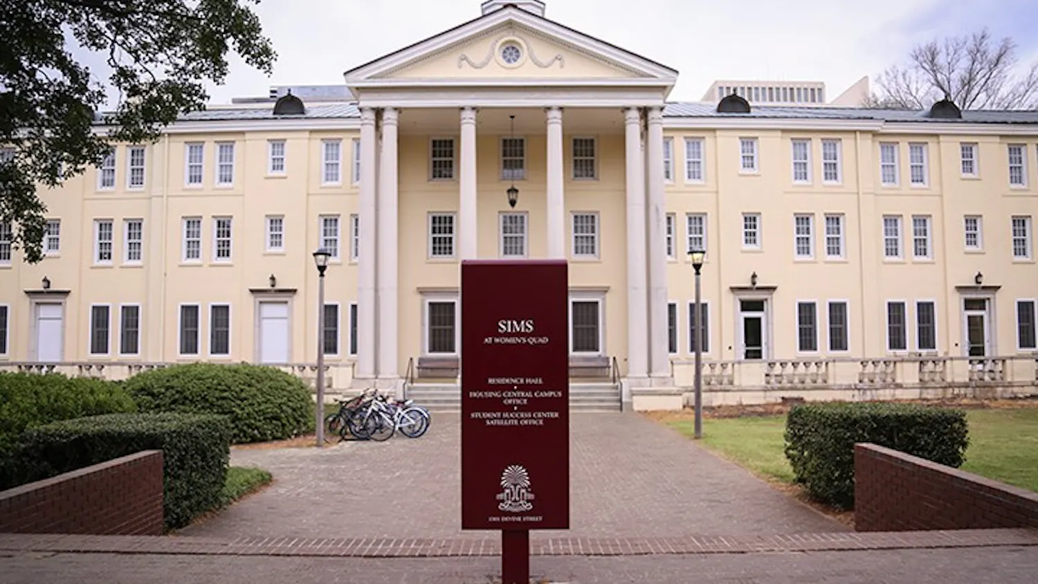 The Sims residence hall, located on Bull Street, makes up a section of Women's Quad. A name change is being discussed for the building.