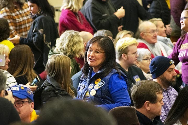 Volunteers and attendees watch Pete Buttigieg speak the Get Out the Vote town hall in Seven Oaks Park on Feb. 29, 2020.