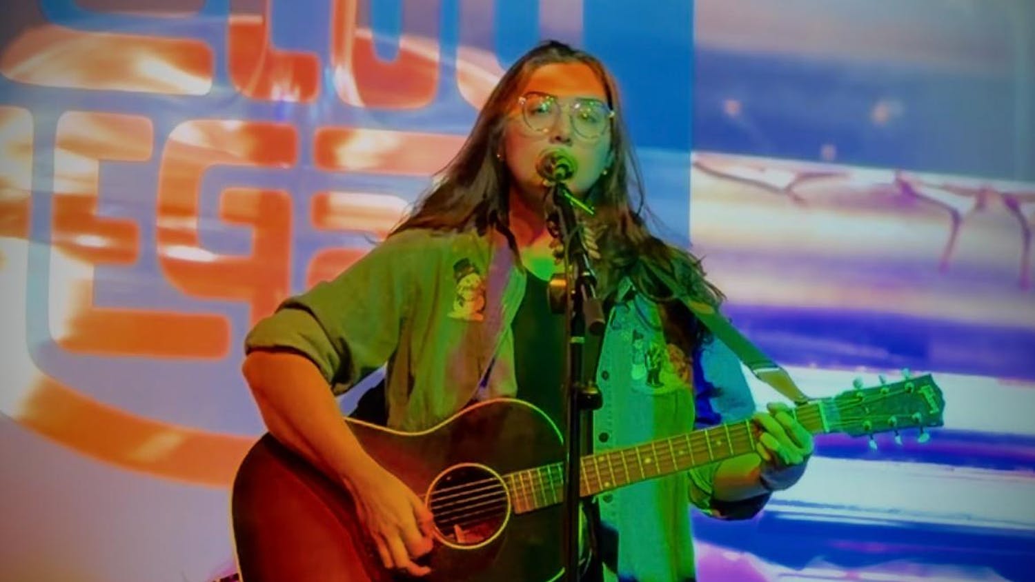 USC alumna Faith Martin sings on stage on Dec. 21, 2025. Martin worked as a child forensic interview specialist before pursuing music as a career.