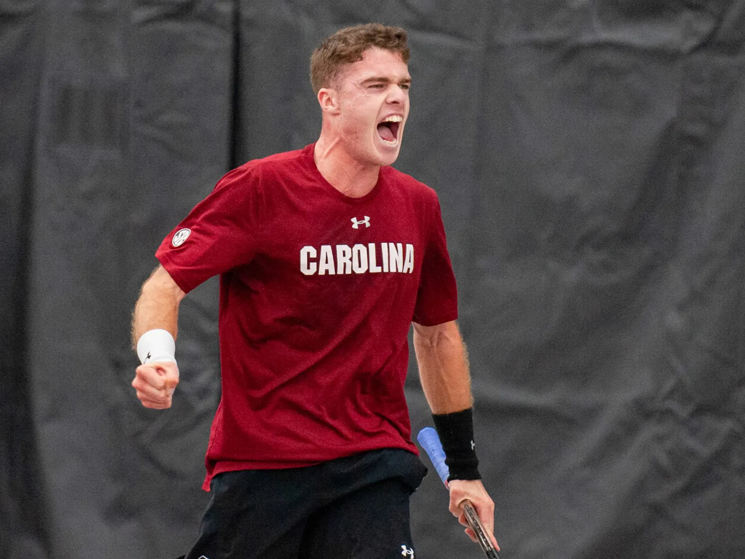 Junior Daniel Rodrigues plays up in his doubles match against Wake Forest. Rodrigues and sophomore Connor Thomson went into the match ranked fifth for D1 doubles.