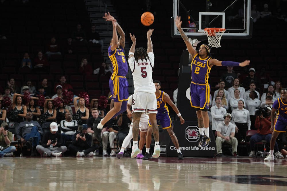 <p>Redshirt senior guard Meechie Johnson rises for a contested jumper as LSU defenders close in during the Gamecocks’ overtime loss to the Tigers at Colonial Life Arena on Jan. 31, 2026. Defensive pressure increased late in the game as both teams battled into extra time.</p>