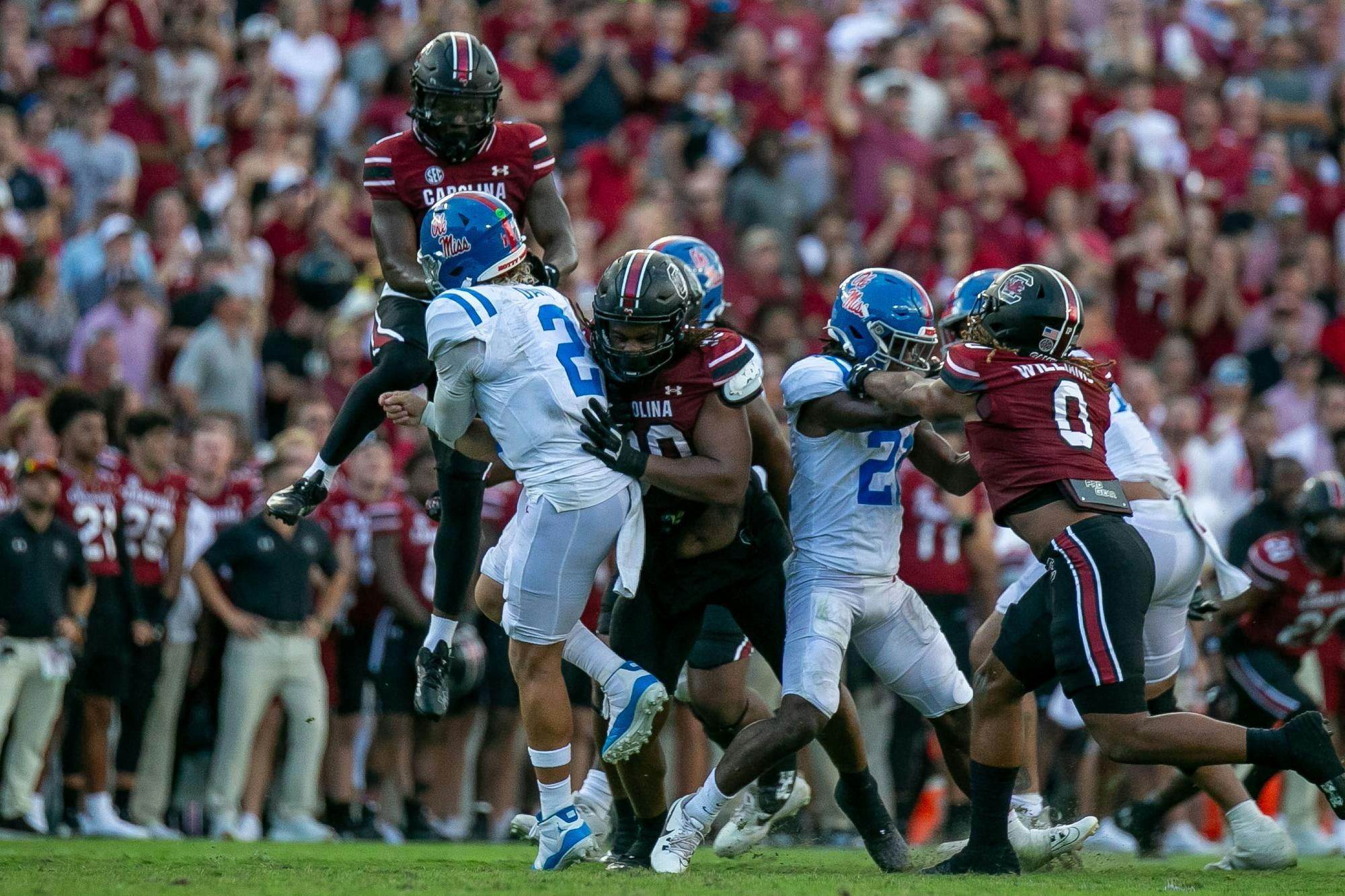 FILE — Junior defensive back DQ Smith jumps to try and block the pass while redshirt junior defensive tackle T.J. Sanders goes for the tackle during South Carolina's game against Ole Miss on Oct. 5, 2024, at Williams-Brice Stadium. The Gamecocks are 3-3 overall following a week six loss to Alabama.