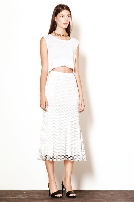 	This crop top and sandals combination would have had Carrie Bradshaw chomping at the bit.