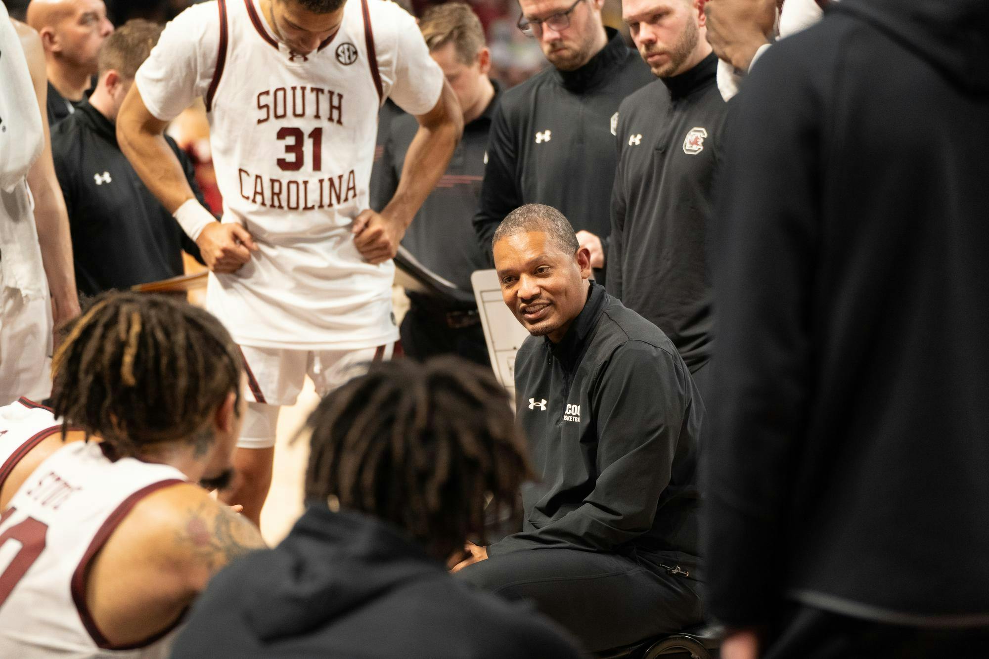 FILE — Head coach Lamont Paris talks to his players during a timeout in the second half. The 2025-26 season is Paris' seventh as a collegiate head coach.