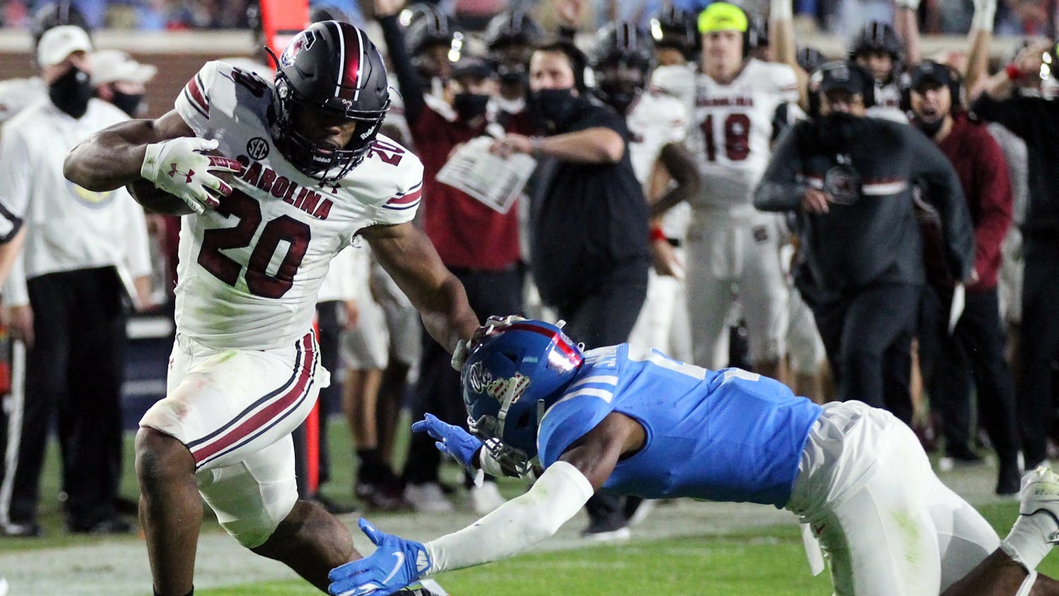 Sophomore running back Kevin Harris avoids being tackled while carrying the ball during the game against the Ole Miss Rebels Saturday. The Gamecocks lost 59-42 and their record fell to 2-5.