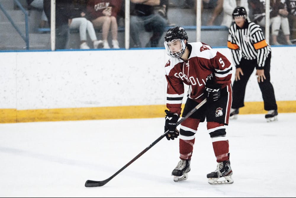<p>Defender Sean Reid (#5) waiting for the face off at the South Carolina club hockey match vs. College of Charleston on Sep. 16, 2022.</p>