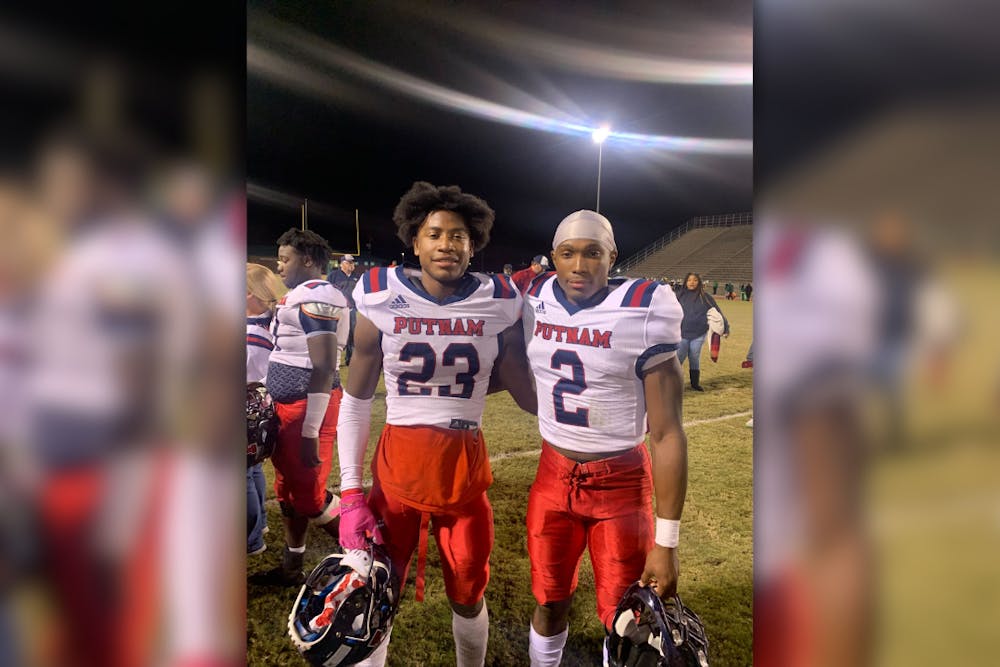 <p>Jalon and Gerald Kilgore compete for Putnam County High School against the Fitzgerald High School College and Career Academy in the third round of the Georgia 2A playoffs on Nov. 26, 2021. The brothers were recently reunited at the University of South Carolina after playing apart for two years. </p>