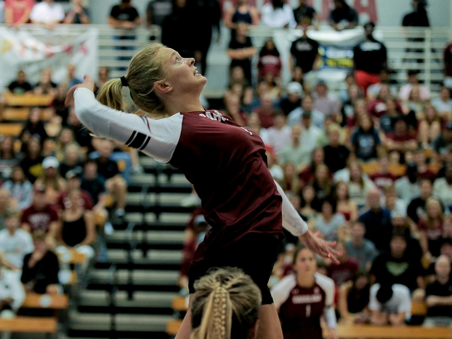 Senior outside hitter McKenzie Moorman jumps to hit the ball during the third and final set against Omaha during the Carolina Classic on Aug. 27 at the Carolina Volleyball Center.