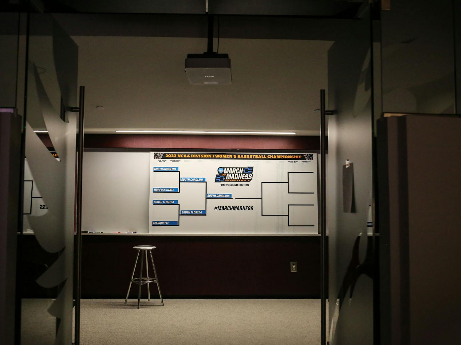 An updated NCAA bracket sits on display in the South Carolina locker room following the Gamecocks' win over South Florida in round two of the NCAA tournament at Colonial Life Arena on March 19, 2023. The Gamecocks defeated the Bulls 76-45.