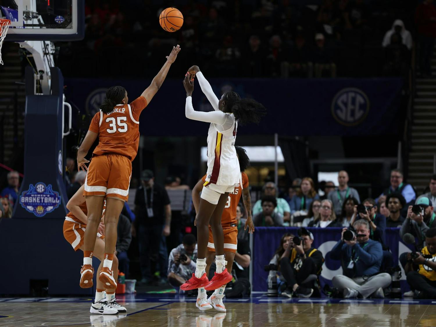 Freshman guard Agot Makeer shoots a contested mid-range shot over a Texas player on March 8, 2026, during the SEC Championship game at Bon Secours Wellness Arena. The Gamecocks fell short to the Longhorns 78-61.