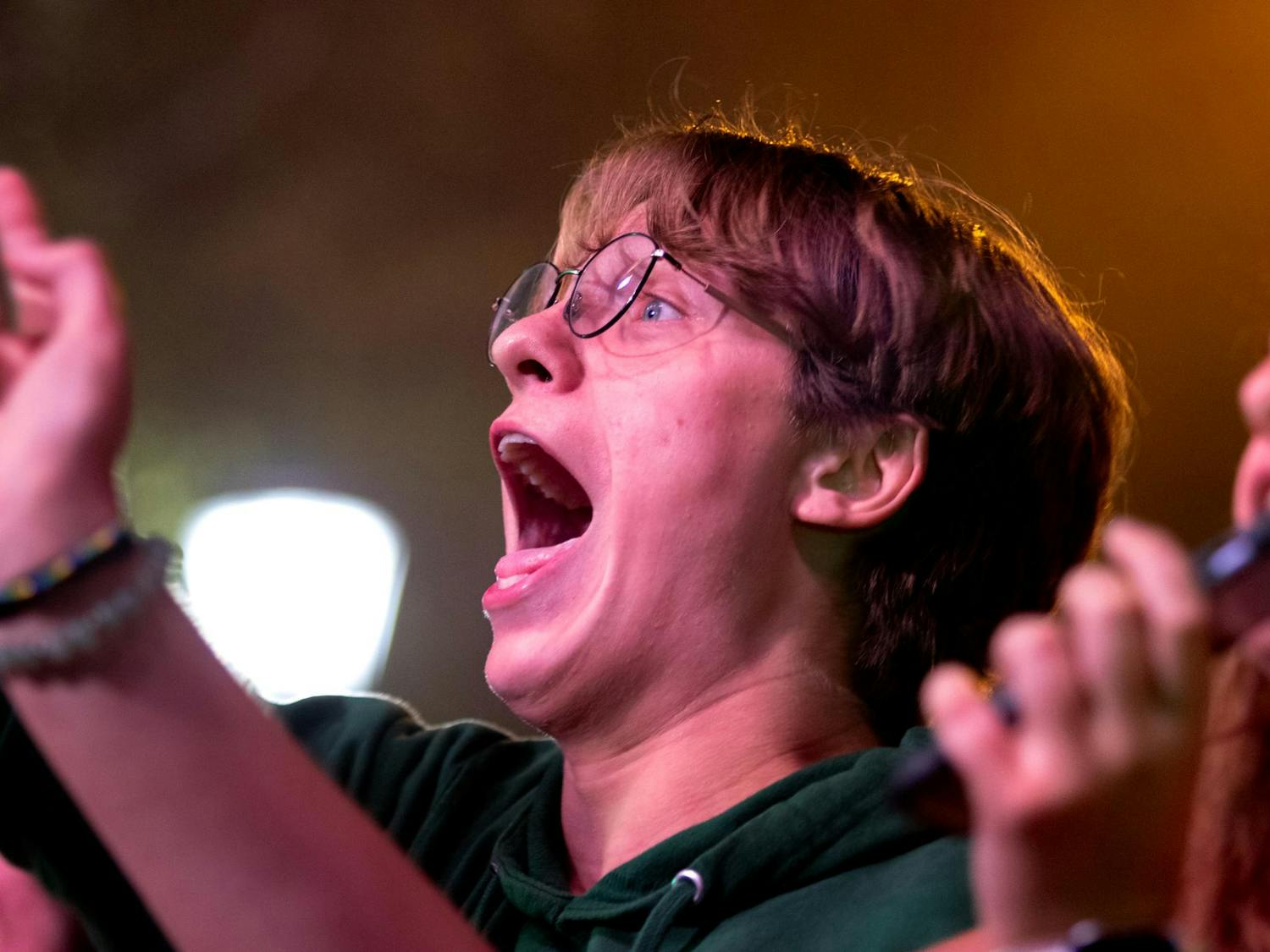 Second-year student David Burns screams in the front row of Cockstock on Oct. 6, 2023. Students in the front row arrived at Greene Street by 6 p.m. and stayed in the pit for over three hours.