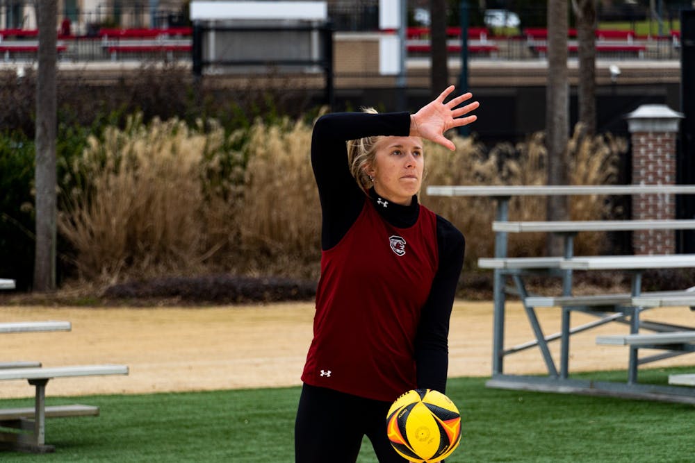 <p>Courtney Weber prepares to set the ball across the net during beach volleyball practice on Jan. 28, 2022. Weber, a former USC indoor volleyball player aims to bring her skills to the South Carolina beach volleyball team.</p>