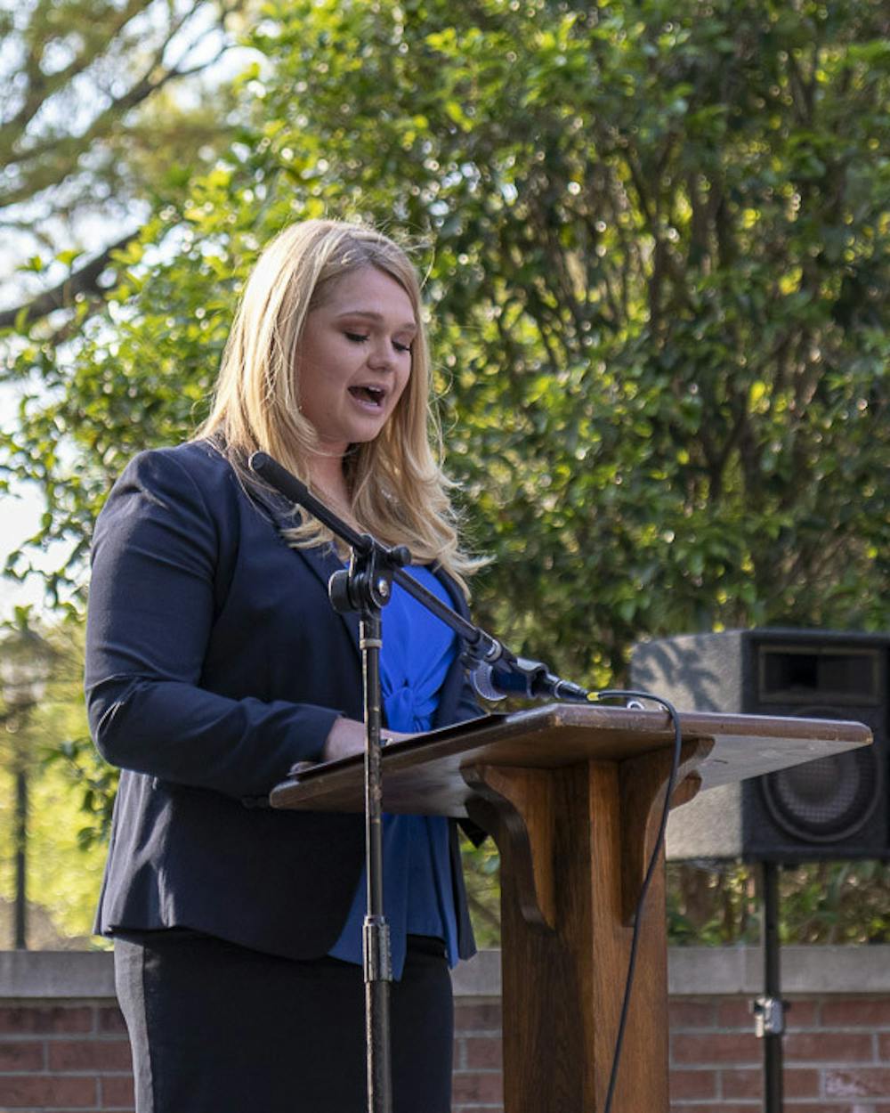 <p>Student body president Reedy Newton gives her State of the Student Body address on the Russell House patio on March 16, 2023. Newton discussed how the university has grown during her term and the achievements, projects and improvements her administration has accomplished during its time in office.</p>