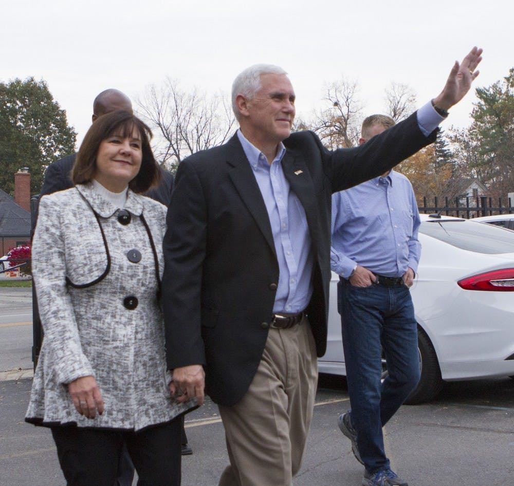Indiana Gov. Mike Pence, the Republican vice presidential nominee, and his family members cast their vote at St. Thomas Aquinas church across the street from the governor's mansion on November 8, 2016 in Indianapolis, Indiana. (Lora Olive/Zuma Press/TNS)