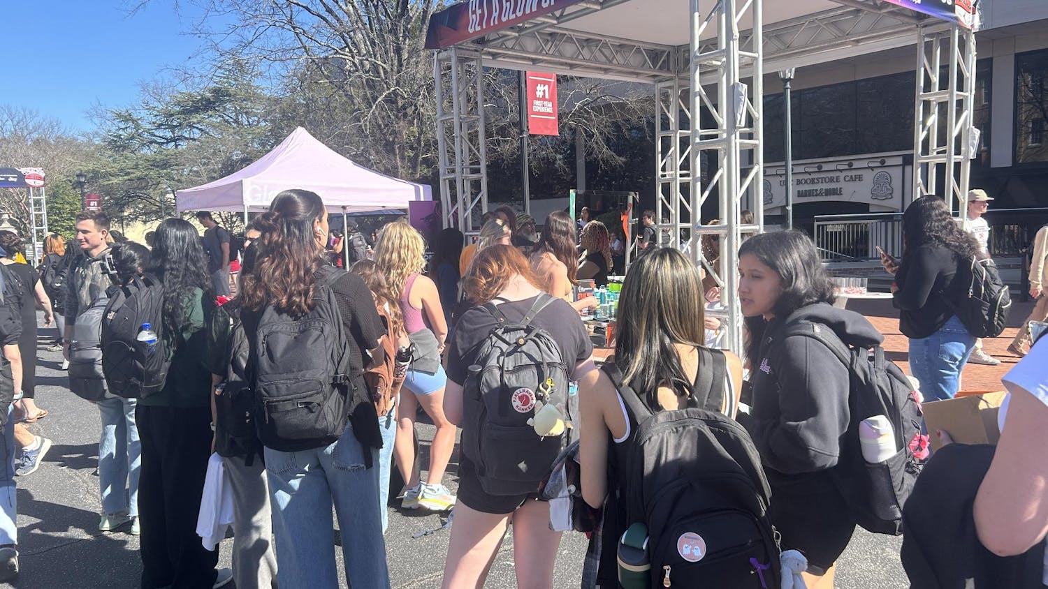 University of South Carolina students wait in line for free aura photos during the WNBA on Campus event on Greene Street on Feb. 25, 2025.
