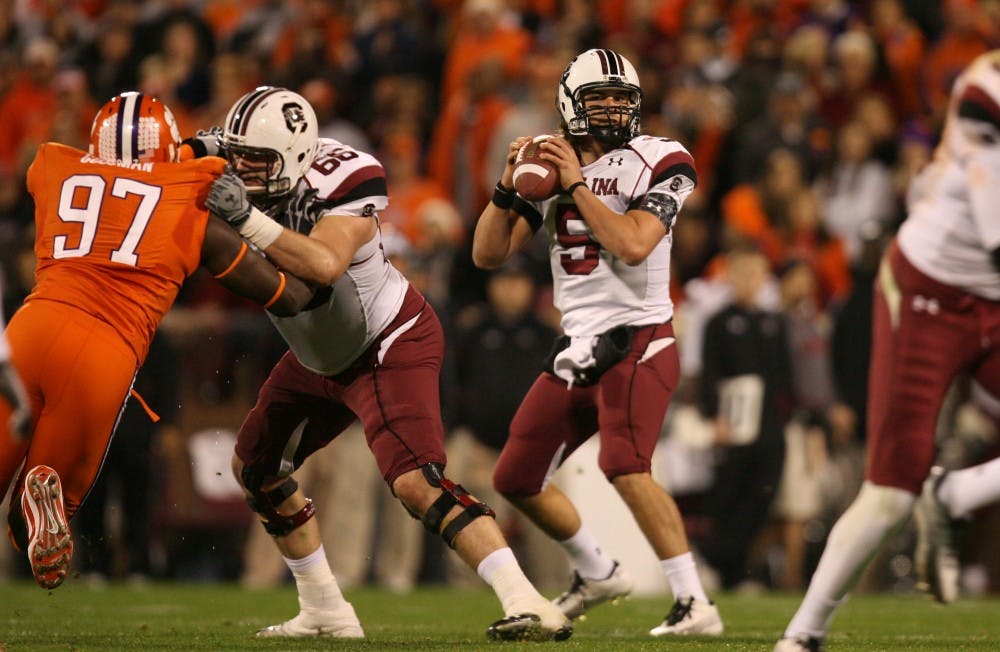 University of South Carolina quarterback Stephen Garcia looks for an open receiver against Clemson in the first quarter at Memorial Stadium, Saturday, November 27, 2010, in Clemson, South Carolina. (C. Aluka Berry/The State/MCT)