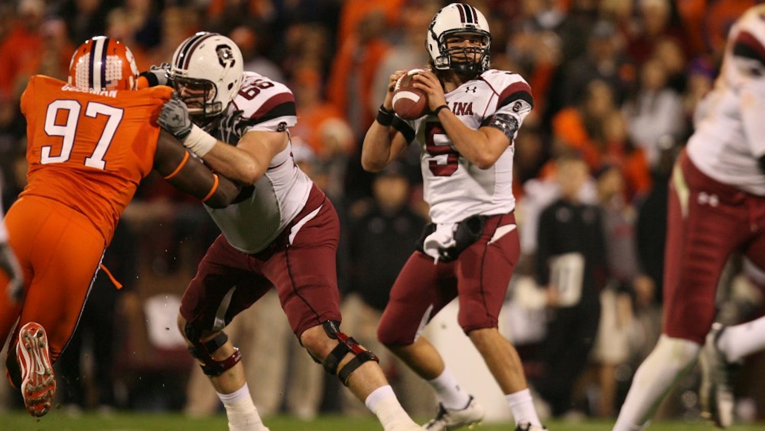 University of South Carolina quarterback Stephen Garcia looks for an open receiver against Clemson in the first quarter at Memorial Stadium, Saturday, November 27, 2010, in Clemson, South Carolina. (C. Aluka Berry/The State/MCT)