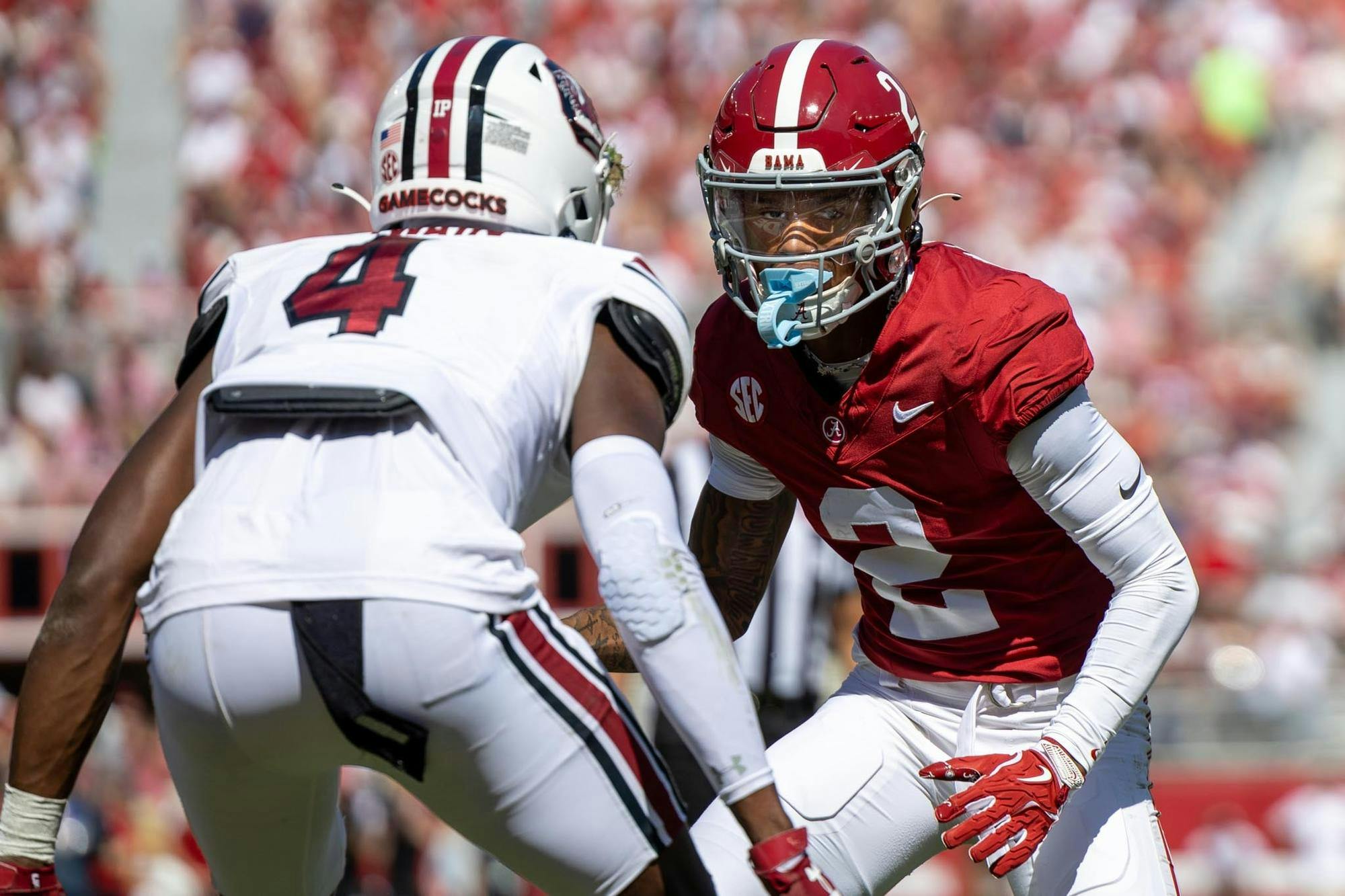 Then-freshman wide receiver Ryan Williams (right) stands across from a South Carolina defender at the line of scrimmage on Oct. 12, 2024 at Bryant-Denny Stadium.