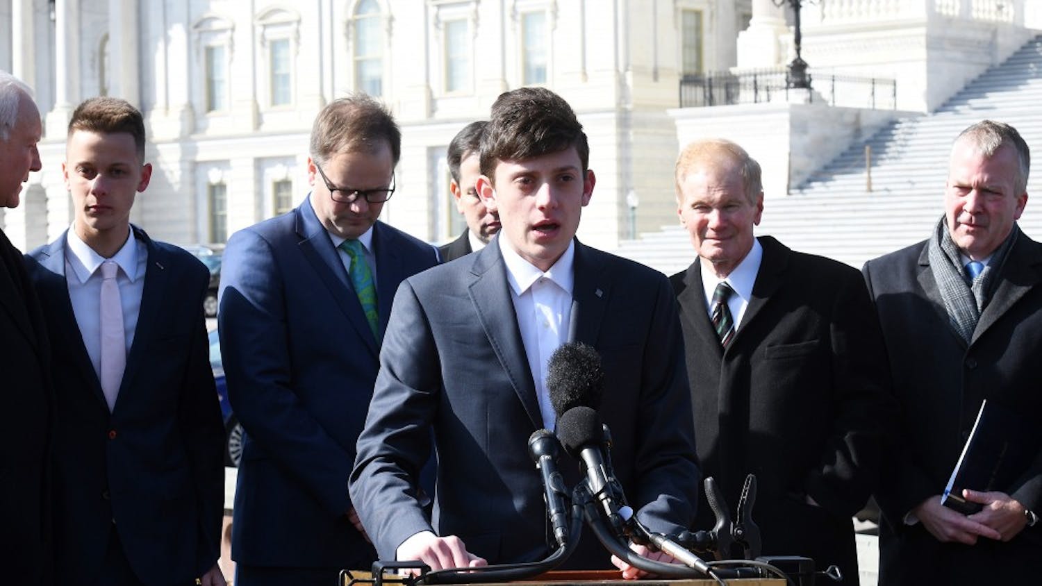 Kyle Kashuv, who survived the shooting at Stoneman Douglas last month, joins Florida Sens. Marco Rubio and Bill Nelson during a press conference to call for swift passage of a bill to address school violence Tuesday, March 13, 2018 on Capitol Hill in Washington, D.C. (Olivier Douliery/Abaca Press/TNS) 