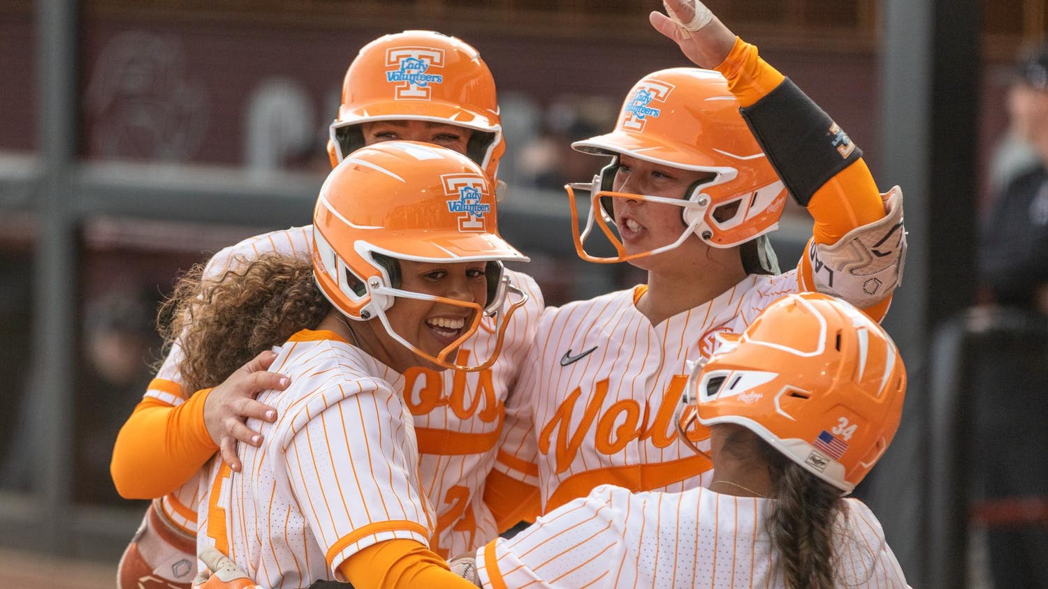 University of Tennessee senior catcher Rylie West (left) celebrates with her teammates after making a two-point home run at the top of the third inning against the University of South Carolina at Beckham Field on March 24, 2024. This marks the senior's eighth home run of the season — her last made against the University of Western Carolina three days prior.