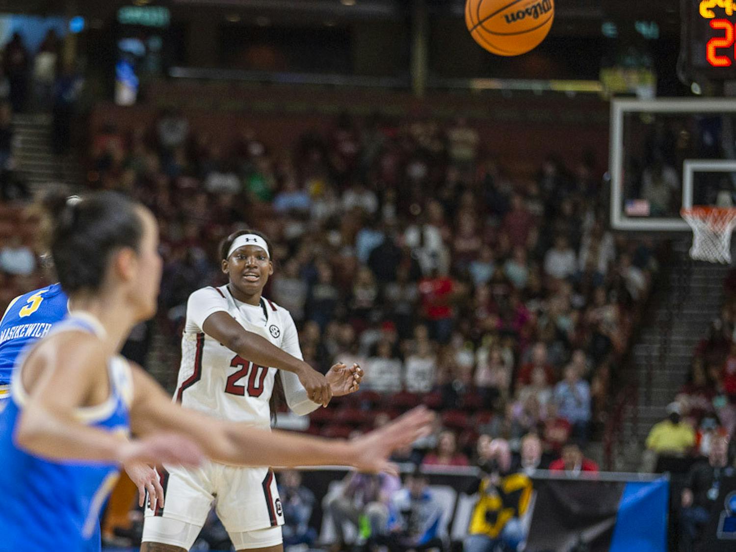 Sophomore forward Sania Feagin passes the ball to a teammate during the matchup between South Carolina and UCLA at Bon Secours Wellness Arena on March 25, 2023. The Gamecocks beat the Bruins 59-43 and will move on to the Elite Eight tournament.&nbsp;